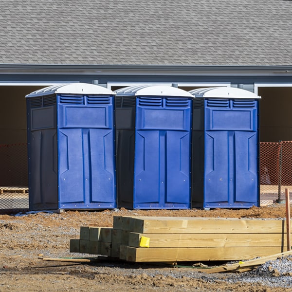 what is the cost difference between standard and deluxe porta potty rentals in Exeter